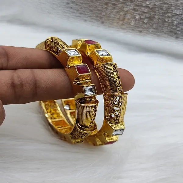 https://d1311wbk6unapo.cloudfront.net/NushopCatalogue/tr:f-webp,w-600,fo-auto/BANGLES -100 RUBY_1674124662169_pvimreyumnl1yly.jpg__Padmawati Bangles   Private Limited